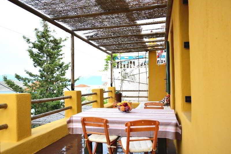 Atlantis Houses Chalki Town Exterior photo